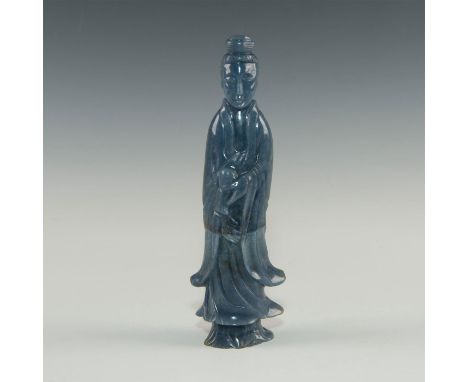 Natural carved blue jadeite jade.Modeled as Guanyin, a female Chinese divinity. Issued: 19th-20th centuryDimensions: 7.35"HCo