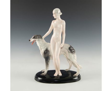 Opulent nude Art Deco woman with large white and gray Borzoi.Large glazed, earthenware Art Deco figure of a nude woman standi