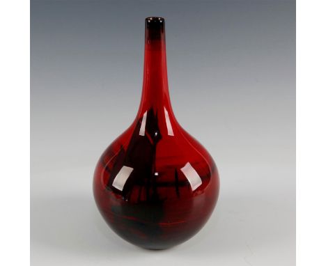 Red bottle shaped ceramic vase with long, slender neck.Royal Doulton flambe red glazed vase  decorated with sailboats. The re