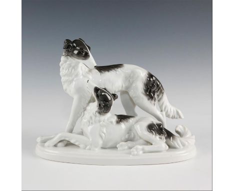 Vintage porcelain two Borzoi (Russian wolfhounds).Beautifully sculpted with a fine attention to the lean elegant lines and fl