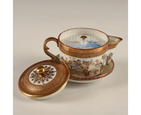 Burgundy, white ground with jet and gilt overall, hand decorated.A beautifully glazed, decorated, four-piece, tea service for