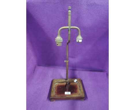 A lobby lamp with adjustable brass neck and twin stem light marked SML to fitment