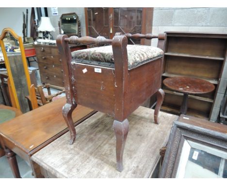 A late 19th Century mahogany piano stool