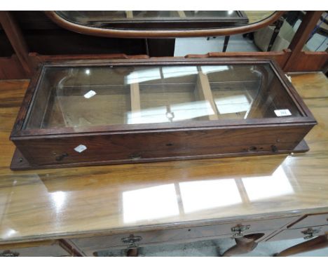 A vintage oak display case