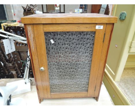 A vintage part oak glazed cabinet