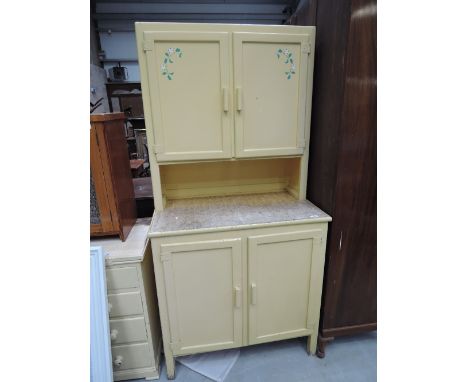 A vintage painted kitchenette