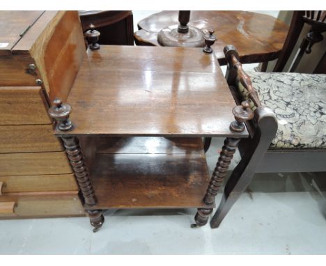 A Victorian mahogany etage having bobbin frame