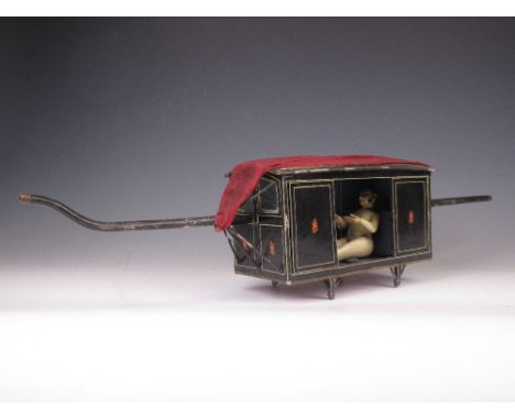 A 19th Century South Indian wood Box Palanquin (meehana) and Figure, c. 1860, painted and varnished, with carry poles and red