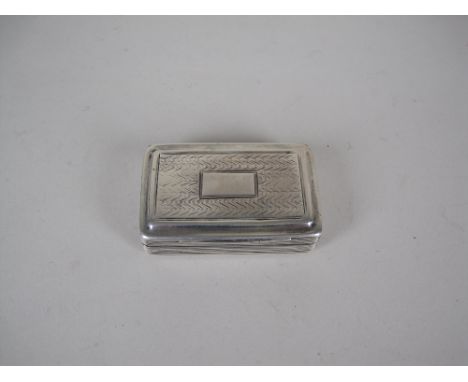 A George IV silver Snuff Box of oblong form with ribbed and zig zag design, vacant cartouche, Birmingham 1825, maker: C &amp;