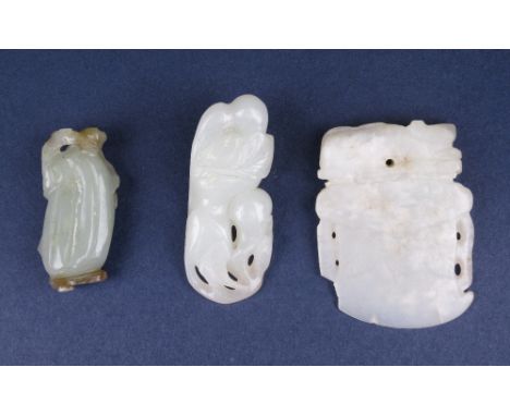 Three Chinese Jade Pendants, Late Qing Dynasty or later, comprising a celadon and russet gourd carving, 2 1/4in. L; a celadon