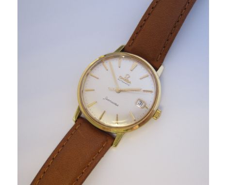 A Gentleman's Omega Seamaster Automatic Wristwatch, the silvered dial with hourly gold baton markers, sweep seconds hand and 