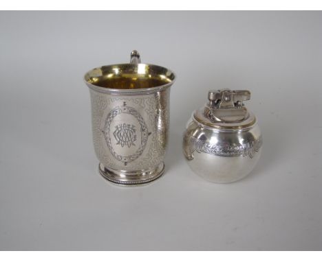 A Victorian silver Christening Mug with seaweed engraving and laurel wreath cartouche with initials, London 1875 and a silver