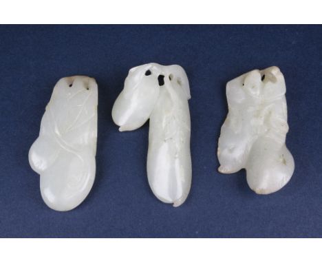 Three Chinese Jade Pendants, late Qing Dynasty or later, pale celadon tone, each carved as a gourd or cluster gourds and leav