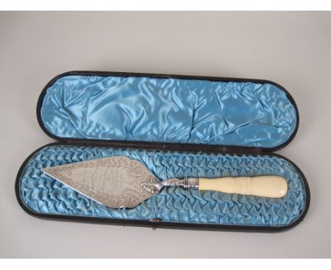 A Victorian silver Presentation Trowel with carved ivory handle, Sheffield 1890, in case