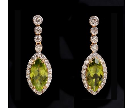 A pair of Diamond and Peridot Earrings each millegrain-set column of four graduated brilliant-cut diamonds suspending claw-se