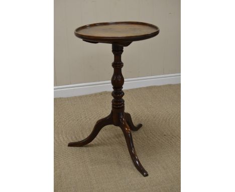 An 18th Century elm Pillar Table with dished circular top on baluster turned column and tripod base, 16 1/2in