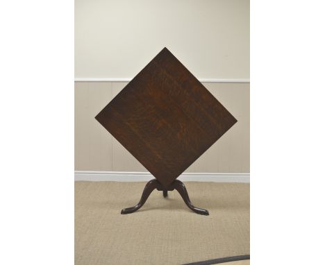 An 18th Century oak Pillar Table with lozenge shape top on turned column and tripod base, 2ft 7in