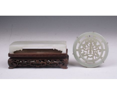 Two Chinese Jade carvings, 19th Century, comprising a rectangular Wrist Rest in the form of a low table on four legs, 3 1/2in