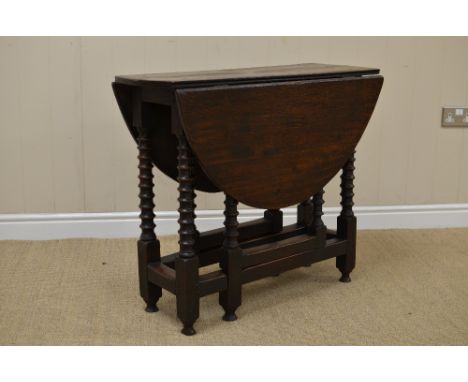 A 17th Century small oak oval Gate-leg Table on bobbin turned and square legs united by square stretchers, 2ft 10in x 3ft 6in