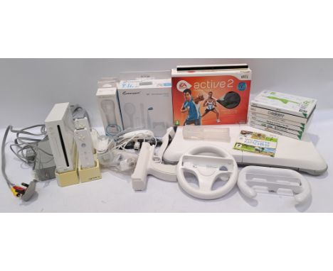Nintendo, a "Wii" Video Game Console, Accessories and Games. Includes "Wii Fit" with others. Although unchecked for completen