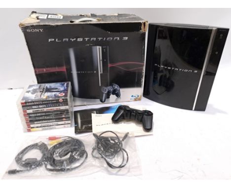 Sony, a Boxed PlayStation 3 with a Collection of Video Games. Includes "Assassins Creed" with others. Although unchecked for 