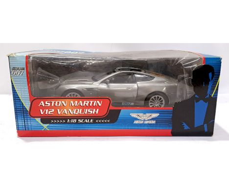 Paul's Model Art (Minichamps), James Bond 007 40th Anniversary 1:18 Scale Aston Martin V12 Vanquish #10011. Although unchecke