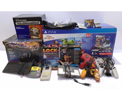 A mixed group of Video Games Accessories. Includes Mattel "Hotwheels PlayStation 2 Racing Wheels" with others. Although unche