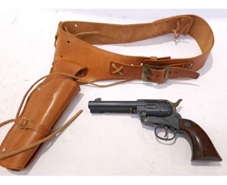 Daisy, a "Vintage" Spittin' Image Colt BB Revolver and Holster. Although unchecked for completeness condition appears general