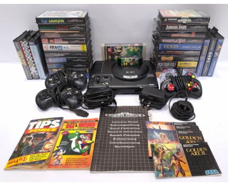 Sega, a unboxed "Mega Drive" 16-Bit Video Games Console with a Collection of Games. Includes "Sonic the Hedgehog 2" with othe