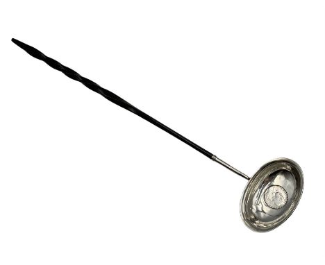 Georgian silver toddy ladle, the bowl set with a George II 1798 silver shilling on a balleen twist handle, L33cm