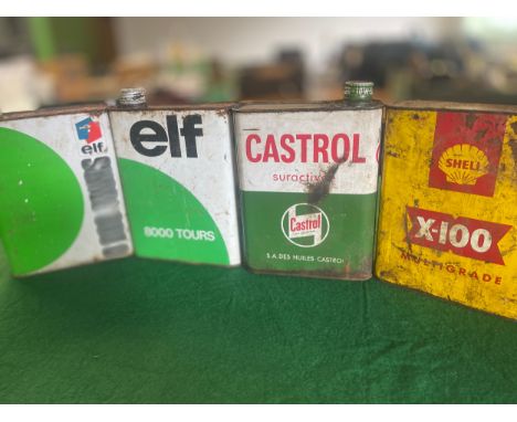 Set of four oil cans including BP Solexine, Shell X100, Elf 8000 and Castrol Self mixing 40 