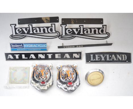 Collection of Leyland vehicles grille badges incl. 2 enamel Manhattan Windsor Tiger badges, 16.5cm tall (with one back plate 