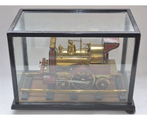Attractive all metal model of an early steam locomotive, possibly live steam, likely scratch built on base with rail section 