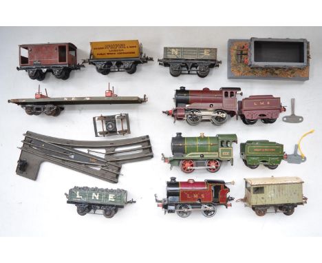 Collection of vintage Hornby Meccano O gauge clockwork steam train models and wagons, a homemade static wagon model on scenic