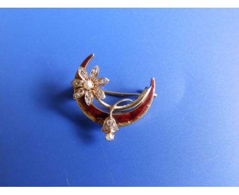A small yellow metal crescent brooch decorated with red guilloche enamel and set  small diamonds &amp; pearls.