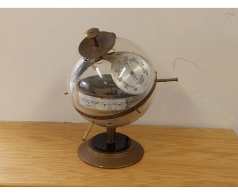 A vintage West German 'Sputnik' barometer weather station.