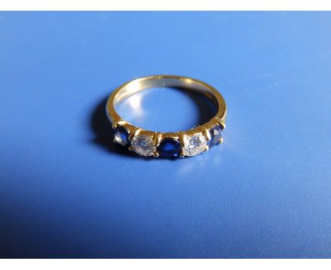 A modern five stone sapphire &amp; diamond half-eternity style ring in 18ct gold, total diamond weight approximately 0.50 car