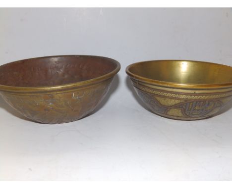 A small Eastern silver inlaid metal bowl and one other. (2)