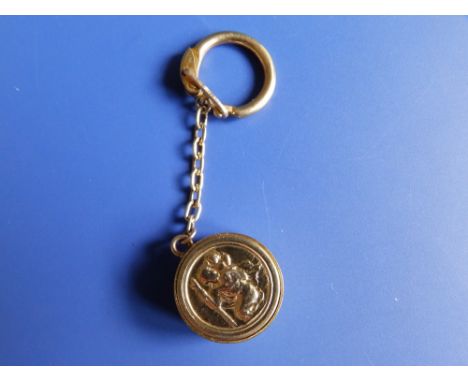 A 9ct gold key ring sovereign holder.