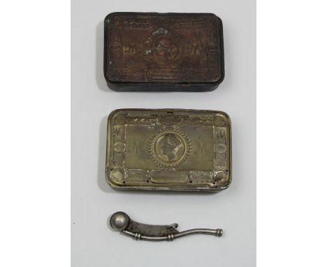Two WWI Queen Mary 1914 Christmas brass tins, together with a Military bosun's whistle, broad arrow marked. 