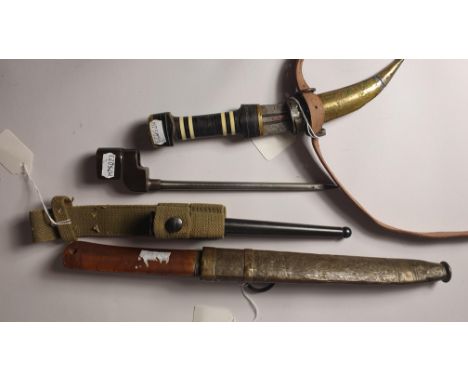 An Arabian dagger, an Asian dagger and a bayonet (3).