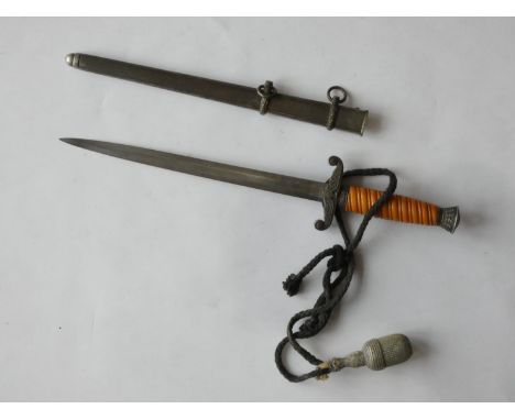 A German ceremonial Third Reich Army Dagger, the plain 29cm double edge steel blade with maker's mark of visored helmet over 