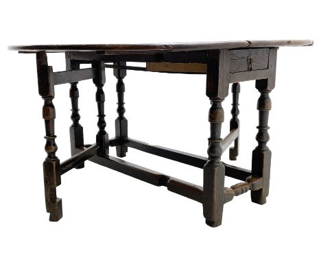 17th century oak dining table, pegged plank drop leaf top on gate-leg action base, turned supports, single drawer to end with