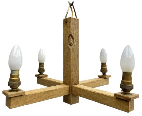 'Rabbitman' oak four branch light fitting, the central stem with tooled decoration and carved with rabbit signature, by Peter