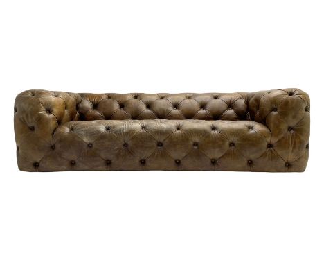 Three seat Chesterfield type club sofa, upholstered in deeply button Brazilian tan brown leatherDimensions: Height:&nbsp;71cm