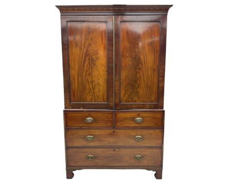 George III inlaid mahogany linen press, the projecting moulded cornice with alternating arcade decoration, two panelled doors