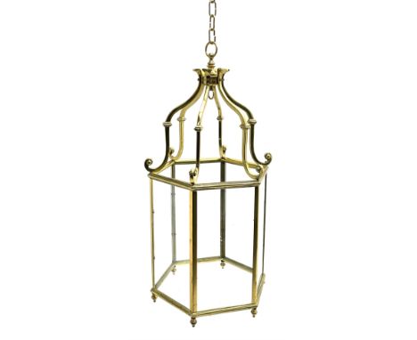 Regency style brass vestibule or hall lantern, glazed hexagonal form with scrolled supports united by upper platform with bra