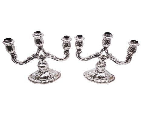 Pair of 20th century German silver three light twin branch candelabra, with wrythen twist detail throughout, each with crown 