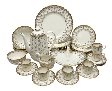 Modern Spode coffee and dinner wares for six place settings, decorated in the Fleur De Lys Gold pattern, comprising dinner pl