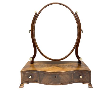 George III mahogany toilet mirror, the oval swing mirror upon curved supports with inlaid turned bone roundels, and serpentin